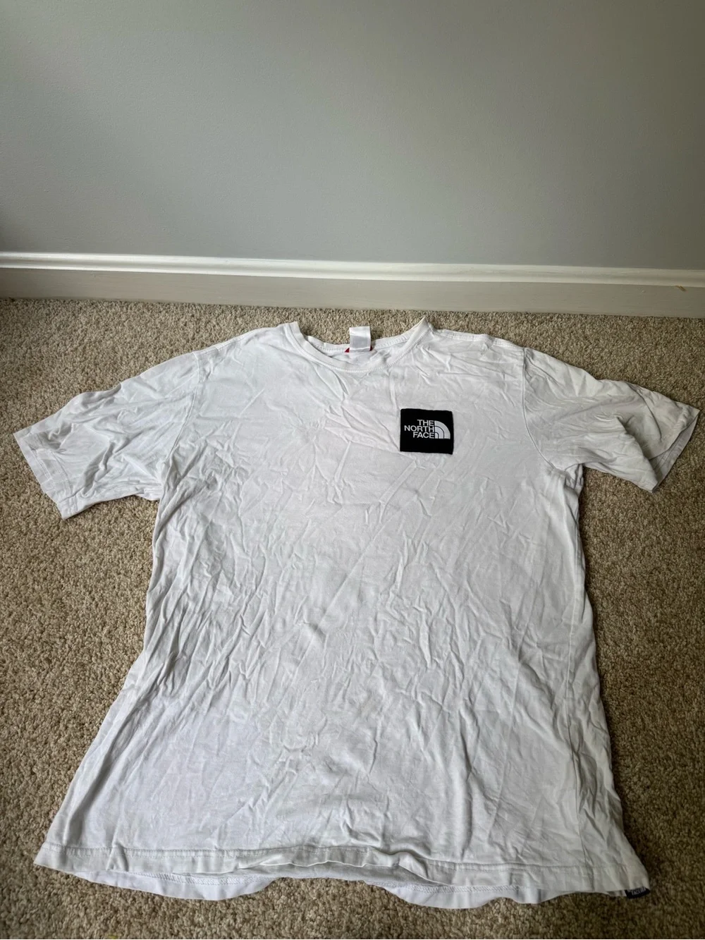 The North Face White Long Sleeve Tee with Black Logo Patch